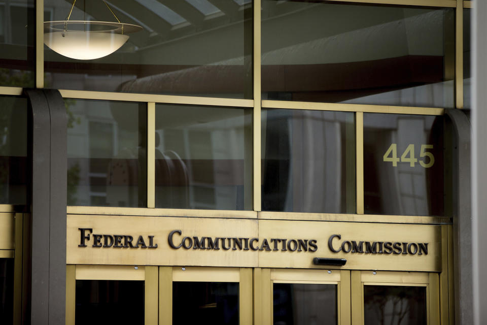 FILE - This June 19, 2015, file photo, shows the Federal Communications Commission building in Washington. The Federal Communications Commission has issued a $6 million fine against the political consultant who sent AI-generated robocalls mimicking President Joe Biden’s voice to voters ahead of New Hampshire’s presidential primary. Steve Kramer also faces two dozen criminal charges in New Hampshire. Kramer has admitted orchestrating the message sent to thousands of voters. (AP Photo/Andrew Harnik, File)