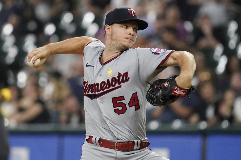 Minnesota Twins starting pitcher Sonny Gray throws to a Chicago White Sox batter during the first inning of a baseball game in Chicago, Friday, Sept. 2, 2022. (AP Photo/Nam Y. Huh)