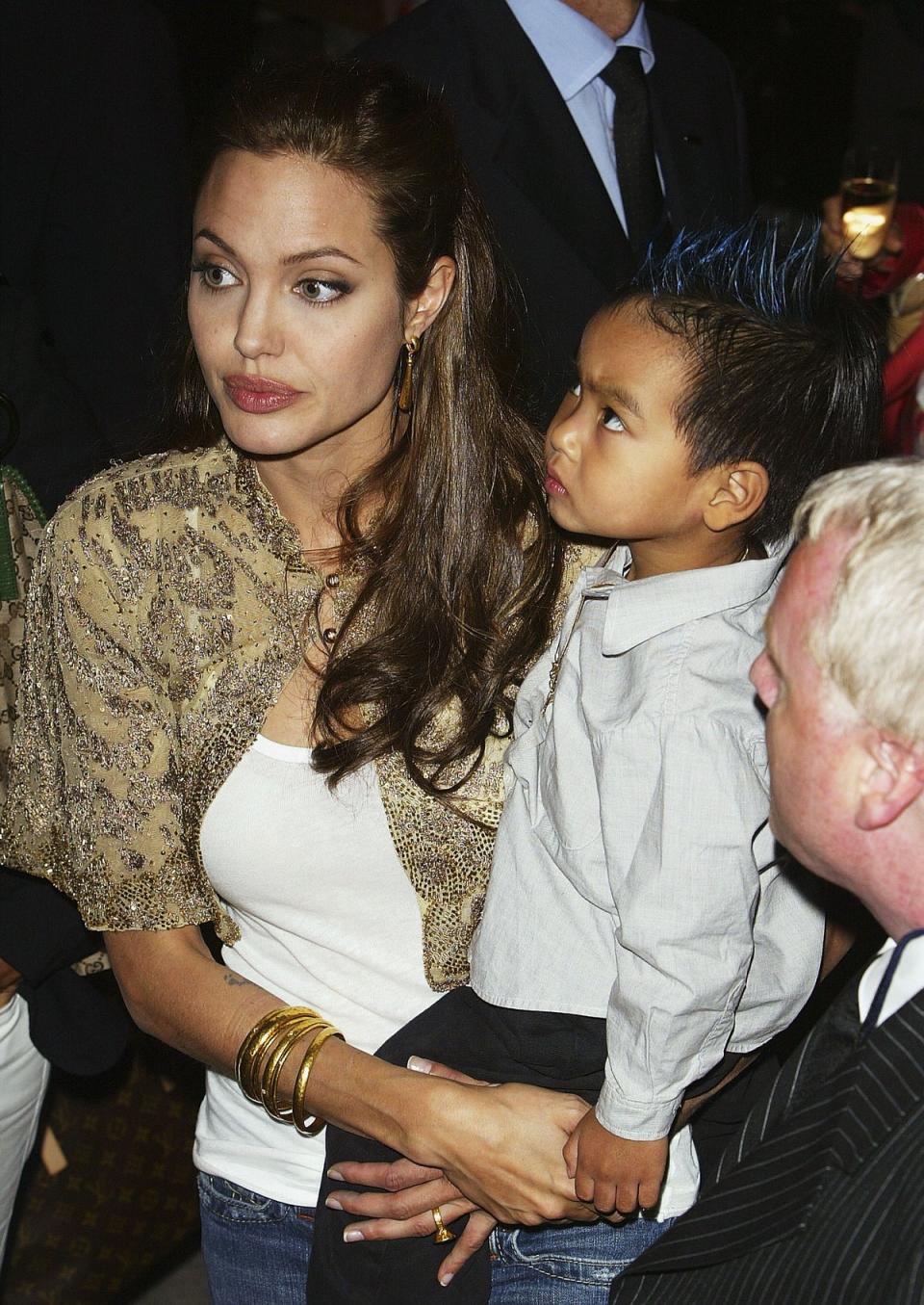 Angelina Jolie and her son Maddox attend the world premiere of Shark Tale in San Marco Square, as part of the 61st Venice Film Festival on September 10, 2004  (Getty Images)