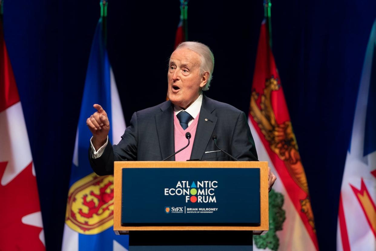Former prime minister Brian Mulroney speaks during the Atlantic Economic Forum at St. Francis Xavier University in Antigonish, N.S., in 2023. (Darren Calabrese/The Canadian Press - image credit)