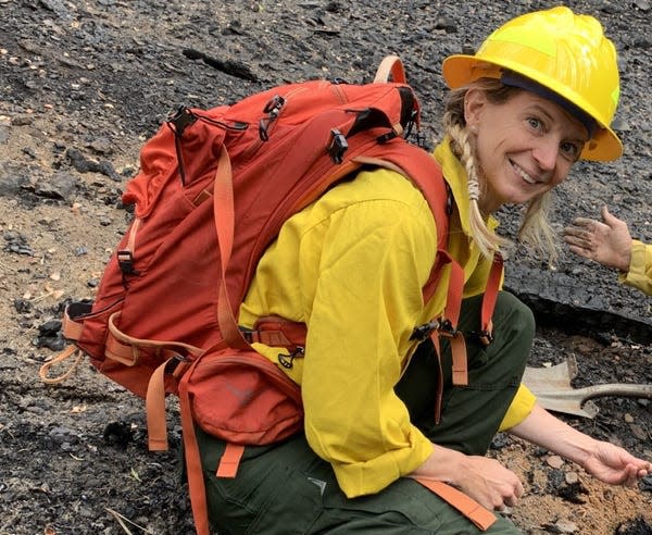 Nina Oakley, a research meteorologist, assists in examining burn severity on a recent California wildfire.