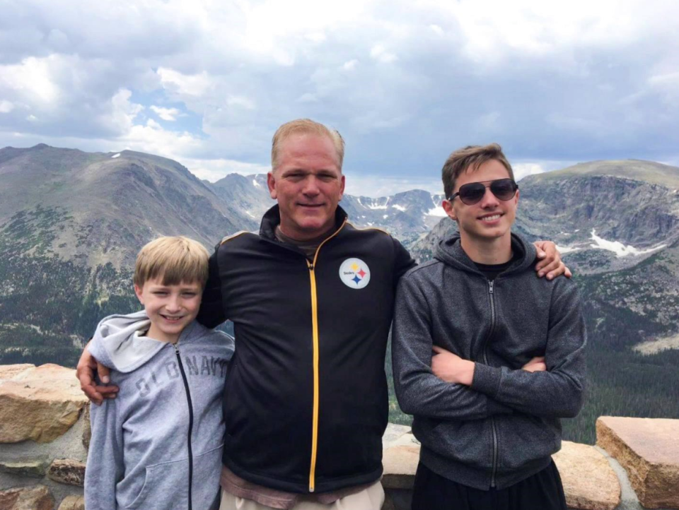 This 2018 photo shows Michael Kunovich, center, on vacation with his sons Max, left, and Michael Jr. at Rocky Mountain National Park in Colorado.
