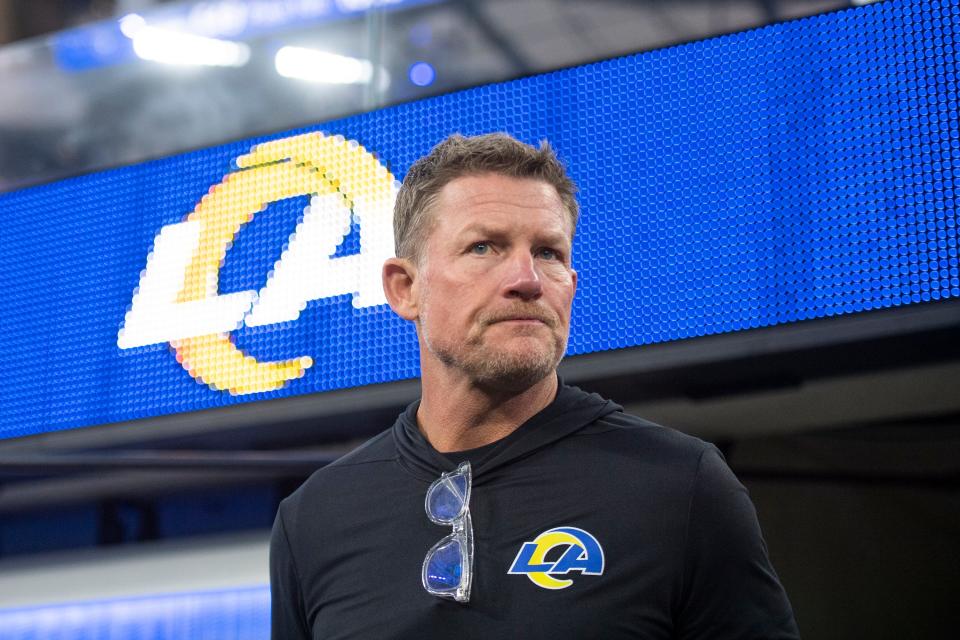 FILE - Los Angeles Rams general manager Les Snead walks on the field before an NFL football game against the Tennessee Titans, Nov. 7, 2021, in Inglewood, Calif. Los Angeles Rams head coach Sean McVay and Snead have agreed to contract extensions announced Thursday, Sept. 8, 2022, keeping the defending Super Bowl champions' brain trust in place with lucrative new deals through the 2026 season. (AP Photo/Kyusung Gong, File)