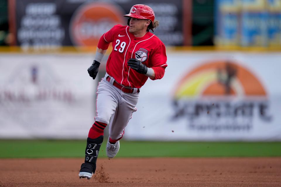 Cincinnati Reds center fielder TJ Friedl (29) rounds second on his way into an RBI triple in the first inning of the MLB Cactus League spring training game between the San Francisco Giants and the Cincinnati Reds at Scottsdale Stadium in Goodyear, Ariz., on Sunday, Feb. 26, 2023. The Giants came back in the ninth inning to win on a walk-off single off the bat of Will Wilson.