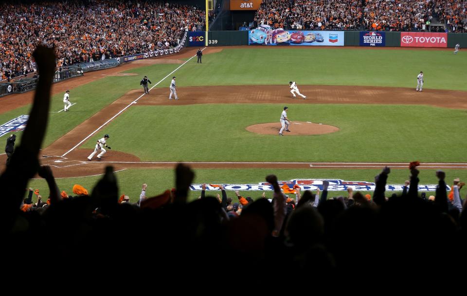 SAN FRANCISCO, CA - OCTOBER 24: Angel Pagan #16 of the San Francisco Giants runs home after Marco Scutaro #19 of the San Francisco Giants hit a single against Justin Verlander #35 of the Detroit Tigers in the third inning during Game One of the Major League Baseball World Series at AT&T Park on October 24, 2012 in San Francisco, California. (Photo by Ezra Shaw/Getty Images)