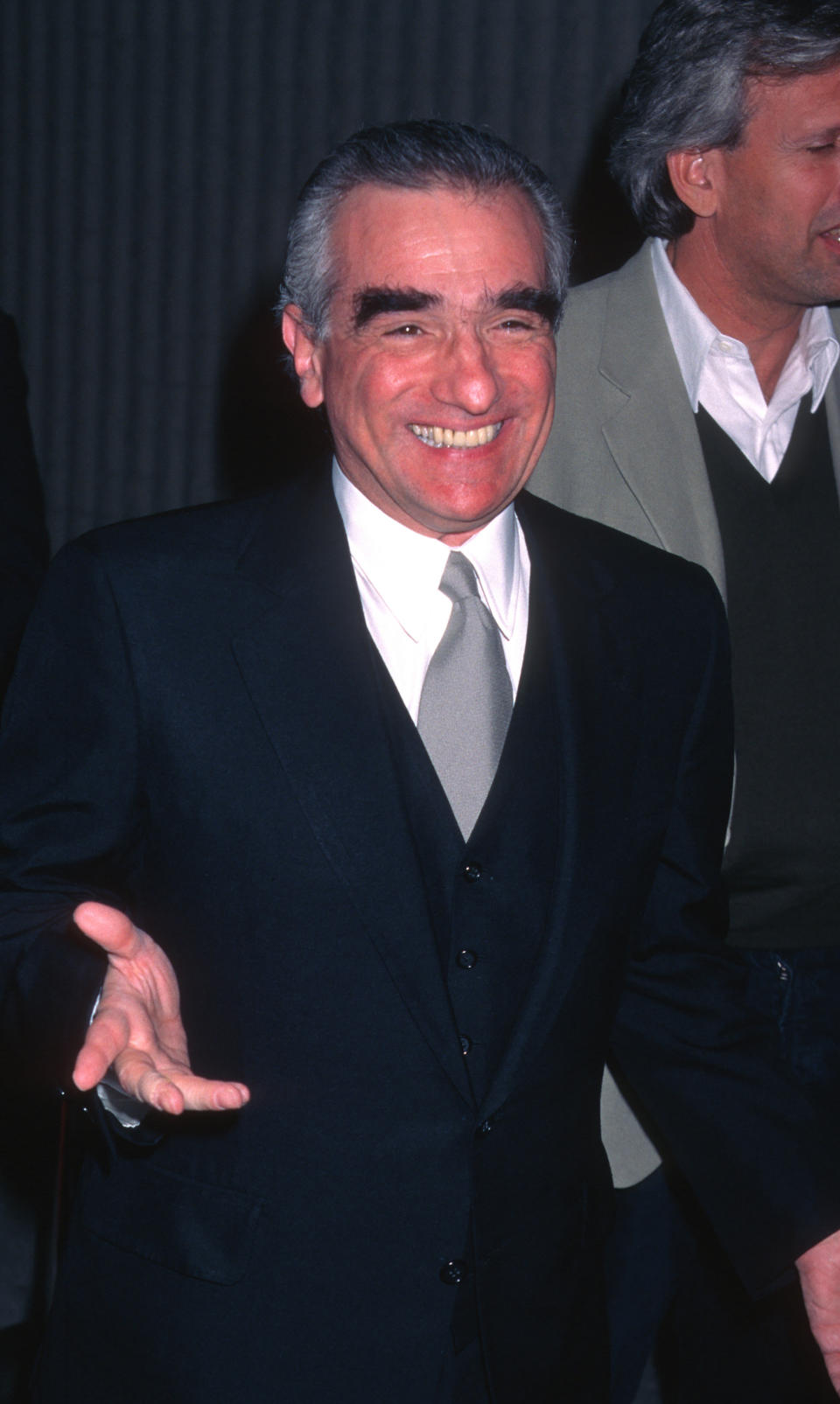 Martin Scorsese smiles on the red carpet for Kundun.