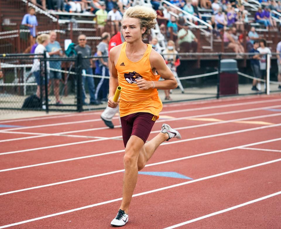 Bloomington North's Griffin Bruce runs the first leg of the 3,200 meter relay during the North boys' track and field regional last Thursday. Bruce qualfied for state in the 1,600 and 3,200 relays and the open 800. (Bobby Goddin/Herald-Times)