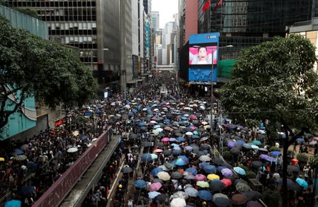 People attend a protest in Hong Kong