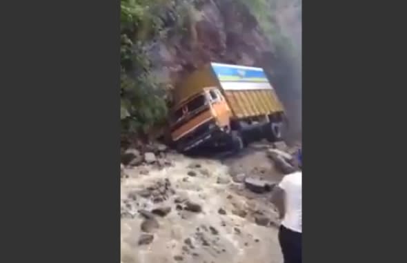 Truck driver braves 'worst road in the world' (video)