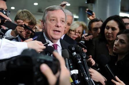 Sen. Dick Durbin (D-IL) speaks to the media after Deputy U.S. Attorney General Rod Rosenstein's classified briefing for the full U.S. Senate on President Donald Trump's firing of FBI Director James Comey in Washington U.S., May 18, 2017. REUTERS/Mary F. Calvert/Files