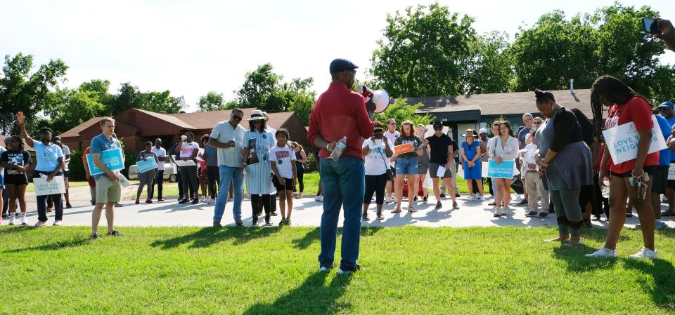 Former U.S. Rep. J.C. Watts leads a prayer for law enforcement outside the Oklahoma City Police Department Springlake Division during a June 5 Peace Walk in northeast Oklahoma City, coordinated by Stronger Together.