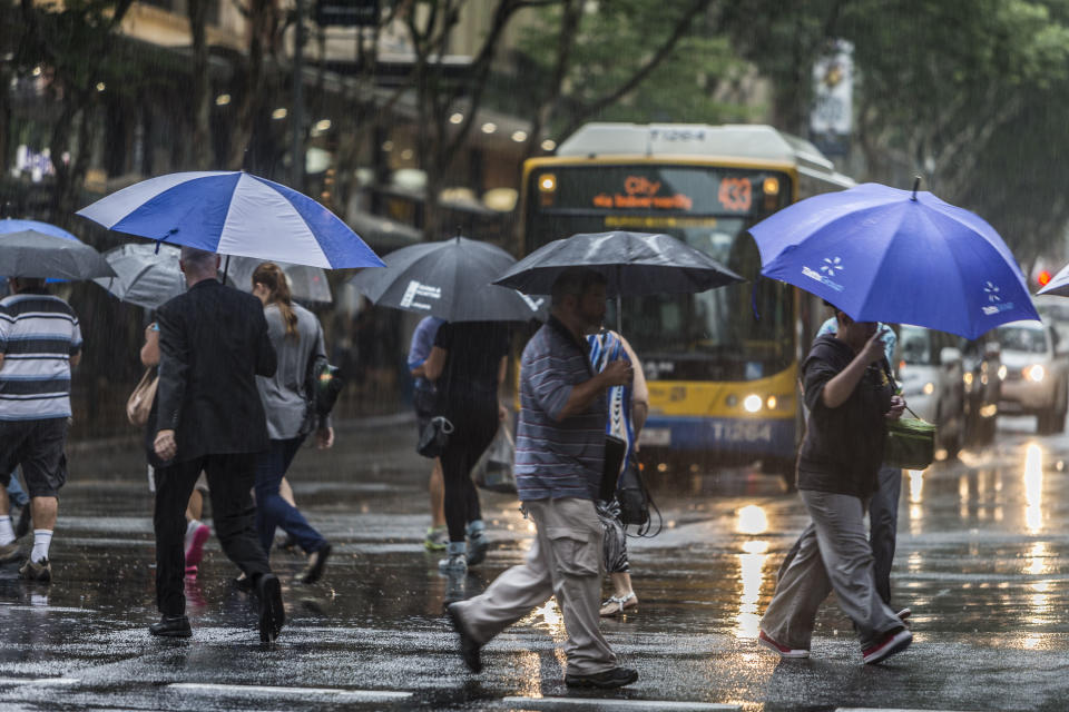 Rain falls on the Brisbane central business district.