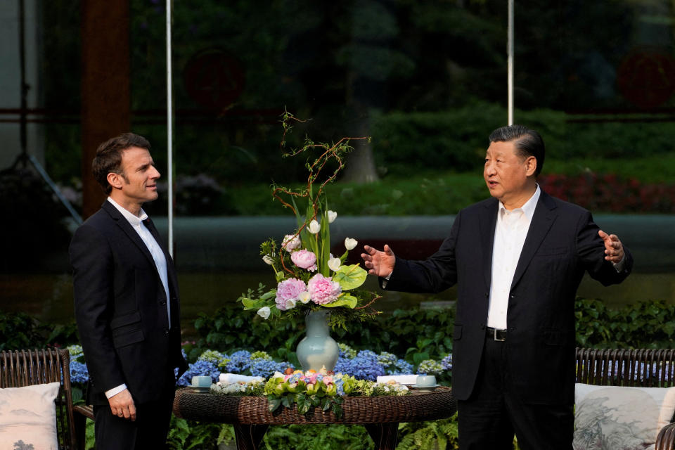 Chinese President Xi Jinping and France’s President Emmanuel Macron attend a tea ceremony at the Guandong province governor’s residence, in Guangzhou, China, Friday, April 7, 2023.  Thibault Camus/Pool via REUTERS