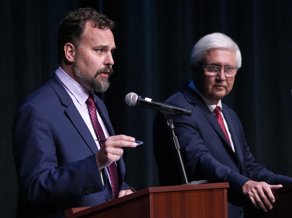 FILE - New Hampshire Republican U.S. Senate candidate Bruce Fenton speaks during a debate as Chuck Morse looks on, Sept. 7, 2022, in Henniker, N.H. New Hampshire will hold its primary on Tuesday, Sept. 13. (AP Photo/Mary Schwalm, File)