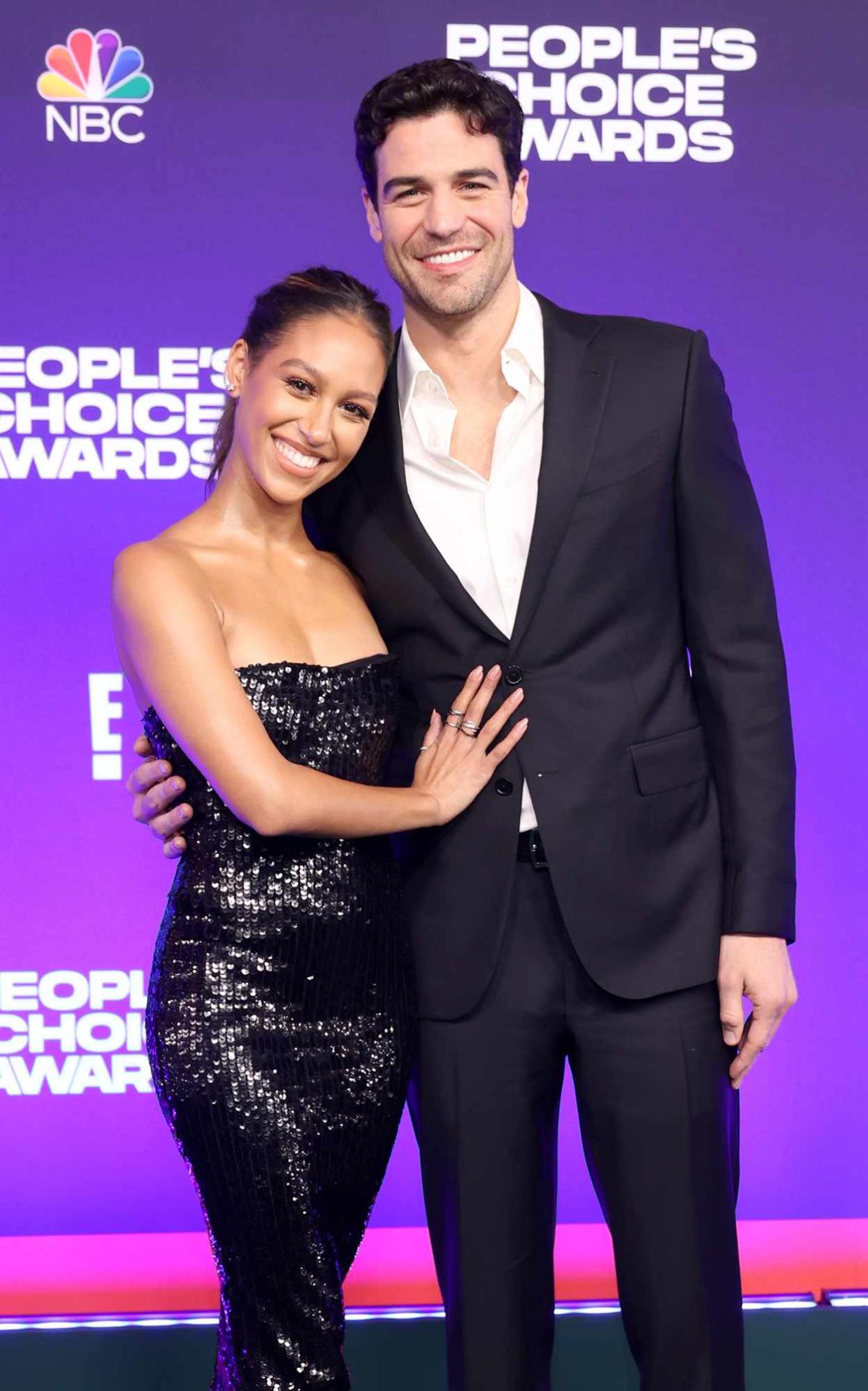 Serena Pitt and Joe Amabile arrive to the 2021 People's Choice Awards held at Barker Hangar on December 7, 2021 in Santa Monica, California