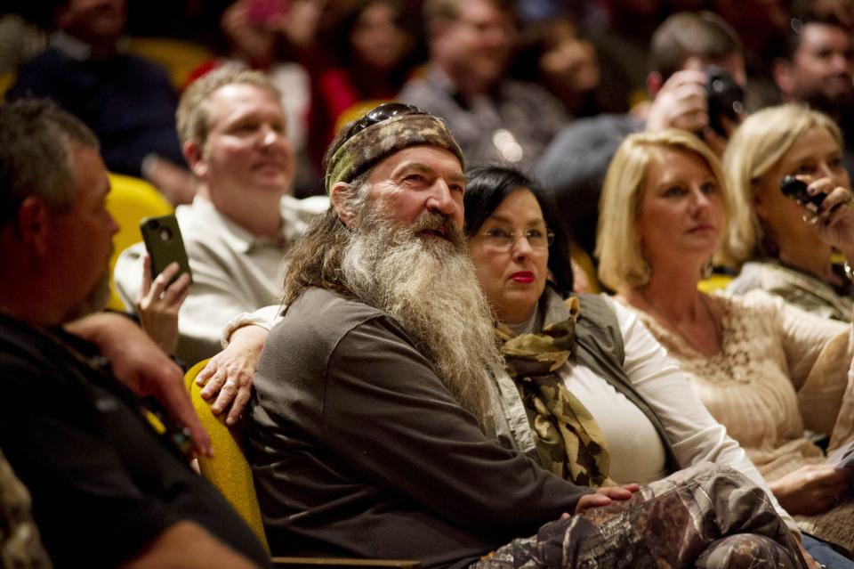 Phil Robertson, center, of the A&E television show "Duck Dynasty," visits Freed-Hardeman University in Henderson on May 4, 2013.