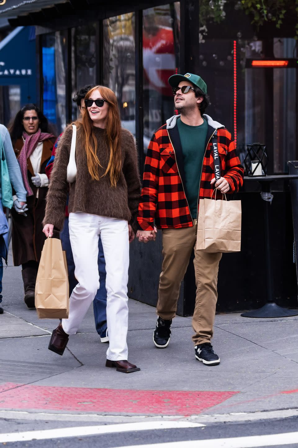 new york, new york march 27 sophie turner l is seen in the west village on march 27, 2023 in new york city photo by gothamgc images