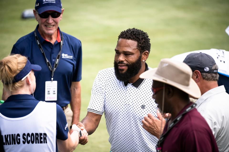 Actor Anthony Anderson greets a scorer during the BMW Charity Pro-Am golf tournament at Greer's Thornblade Club in June. The multip-course tournament is returning to Spartanburg next year.