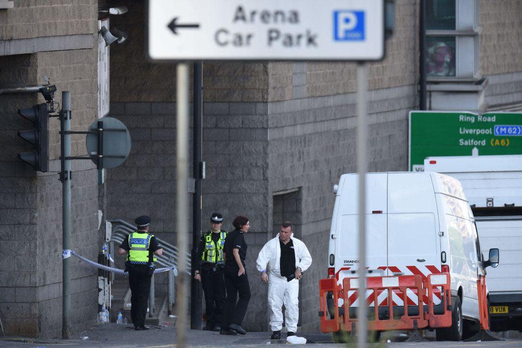 Members of the emergency services work near Manchester Arena following a terror attack at an Ariana Grande concert: Oli Scarff/AFP/Getty Images