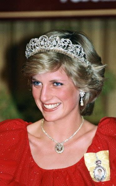 Princess Diana wearing the Prince of Wales Feathers necklace during a Royal Tour of Australia in 1983 - Tim Graham/Getty Images