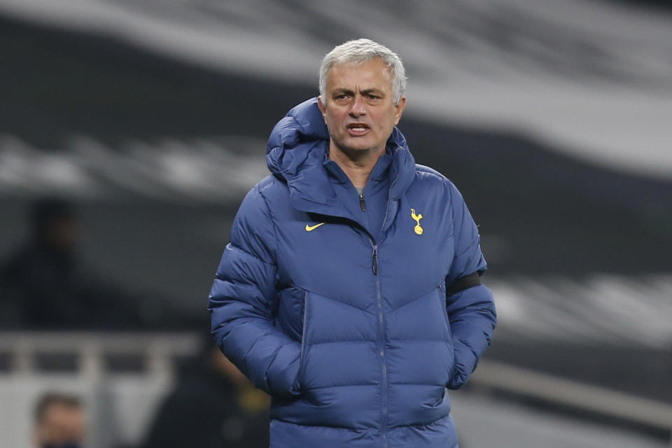 Tottenham's manager Jose Mourinho watches the play during a Group J Europa League soccer match and between Tottenham Hotspur and Ludogorets at the Tottenham Hotspur stadium in London, England, Thursday Nov. 26, 2020. (Ian Kington/Pool via AP)