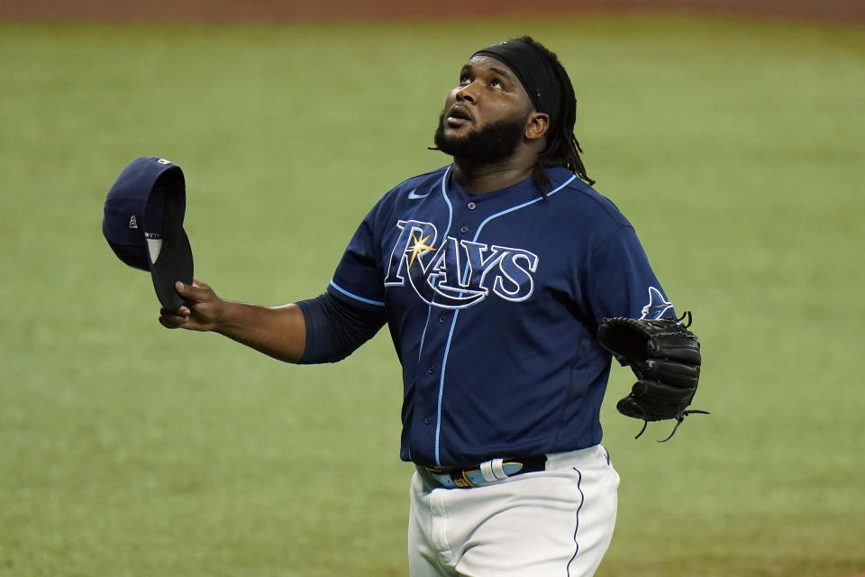 Tampa Bay Rays relief pitcher Diego Castillo reacys after pitching out of trouble against the Philadelphia Phillies during the sixth inning of a baseball game Saturday, Sept. 26, 2020, in St. Petersburg, Fla. (AP Photo/Chris O'Meara)