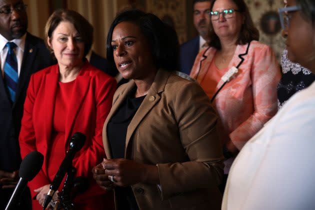 Texas state Rep. Nicole Collier (center) speaks to reporters as U.S. Sens. Amy Klobuchar (D-Minn.) and U.S. Sen. Raphael Warnock (D-Ga.) stand to her right after a meeting between the senators and members of the Texas House Democratic Caucus at the U.S. Capitol on Tuesday. (Photo: Alex Wong/Getty Images)