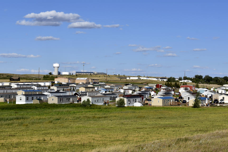 A housing development sits in Aug. 24, 2021, in Watford City, N.D., part of McKenzie County, the fastest-growing county in the U.S. That's according to new figures from the Census Bureau. (AP Photo/Matthew Brown)