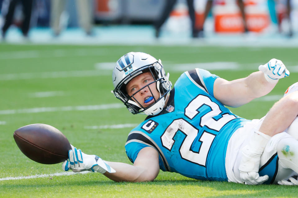 Christian McCaffrey has struggled to stay healthy the past two seasons. Should you prioritize him in 2022 fantasy football drafts? (Photo by Cliff Hawkins/Getty Images)
