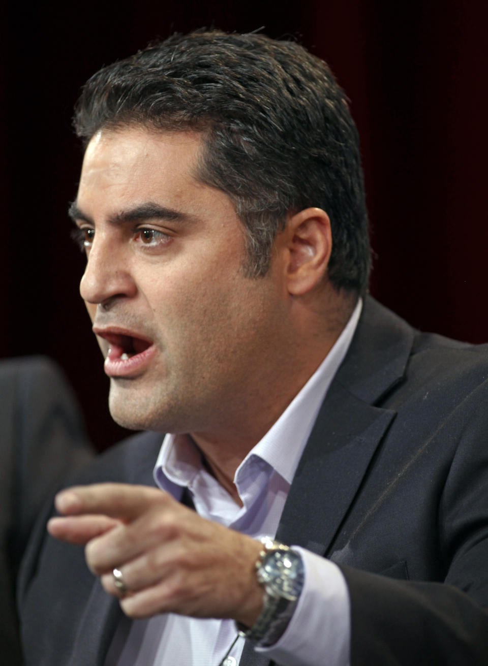 FILE - Cenk Uygur, host of the television show "The Young Turks with Cenk Uygur," speaks at the Television Critics Association Winter Press Tour in Pasadena, Calif., Jan. 13, 2012. On Monday, Dec. 4, 2023, Arkansas election officials said online news personality Uygur, who was born in Turkey, can't appear on the state's Democratic presidential primary ballot in 2024. (AP Photo/Danny Moloshok, File)