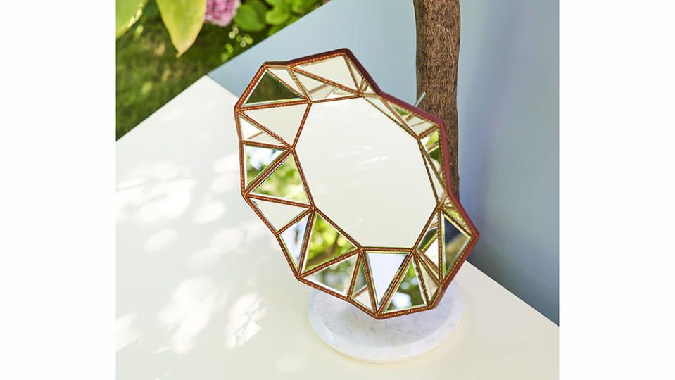 Diamond leather-trimmed mirror by Marcel Wanders Studio, ,650. - Credit: Stevens Frémont