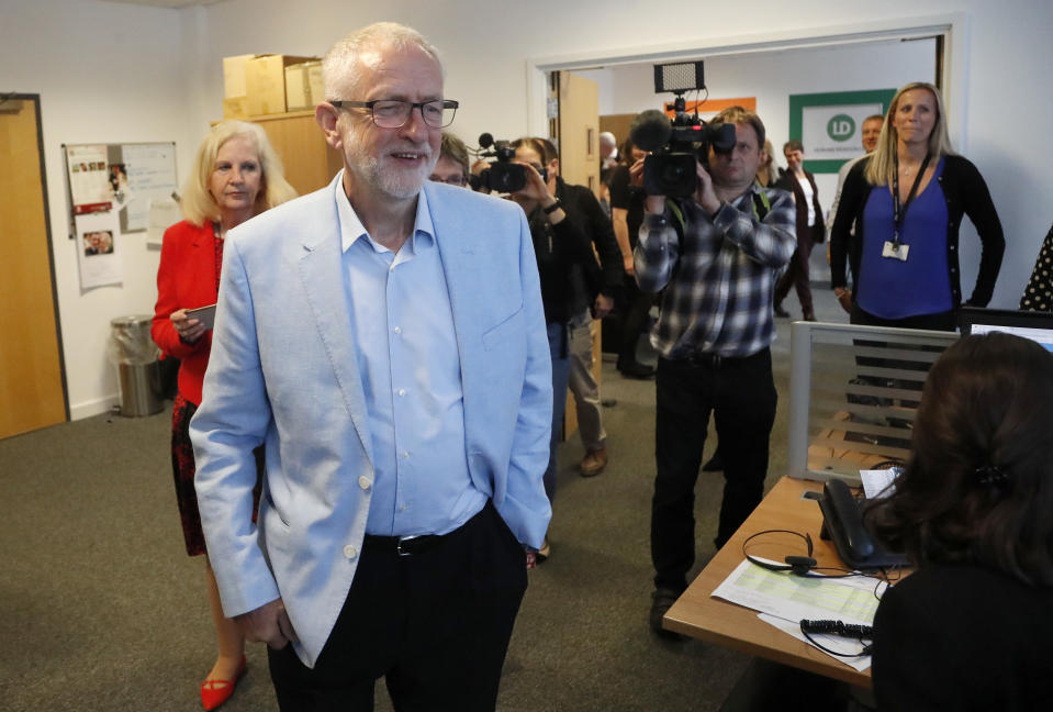 Britain's opposition leader Jeremy Corbyn arrives to meet business leaders at the Business and Technology Centre, Stevenage, England, Tuesday Aug. 20, 2019, to discuss the impact of leaving the EU without a deal. (AP Photo/Frank Augstein)
