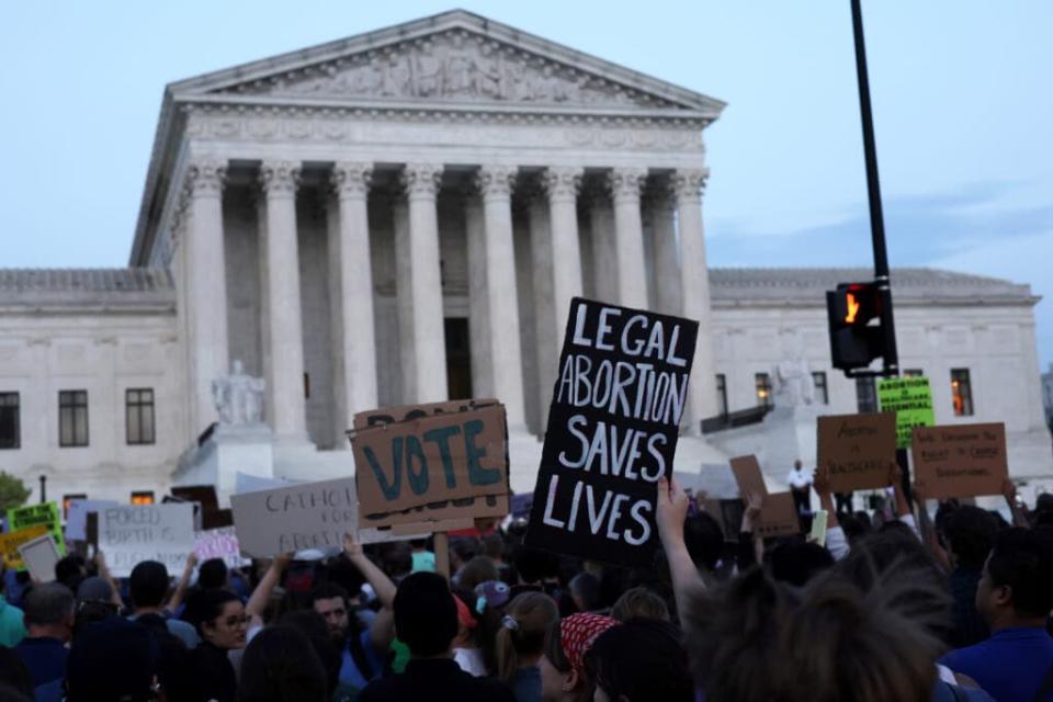 Pro-choice activists protest during a rally in front of the U.S. Supreme Court in response to the leaked Supreme Court draft decision to overturn Roe v. Wade May 3, 2022 in Washington, DC. (Photo by Alex Wong/Getty Images)