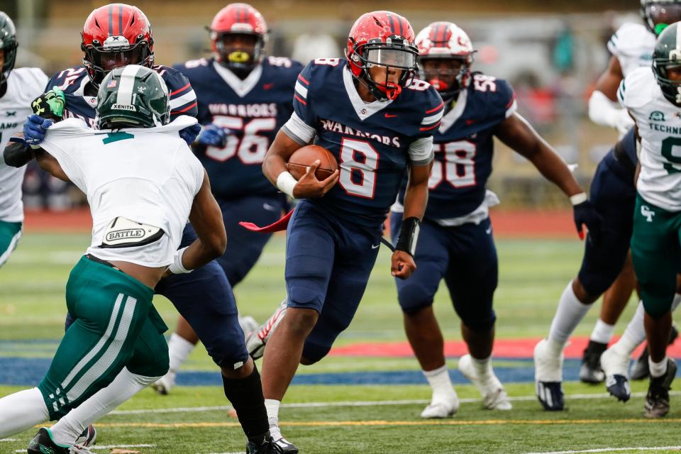 Southfield A&T quarterback Isaiah Marshall (8) runs against Cass Tech during the first half of a district championship game Saturday, Nov. 5, 2022 at Southfield A&T High School in Southfield.