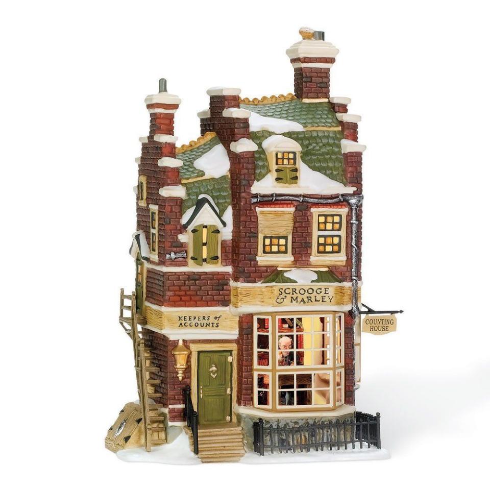 <p><strong>Department 56</strong></p><p>Walmart</p><p><strong>$111.06</strong></p><p>This Department 56 winter village shows Ebenezer Scrooge’s shop set in a stunning brick building. Inside the windows you can see Scrooge counting his money, and the gorgeous detail on the village makes for the perfect addition to your other favorites from the collection.</p>