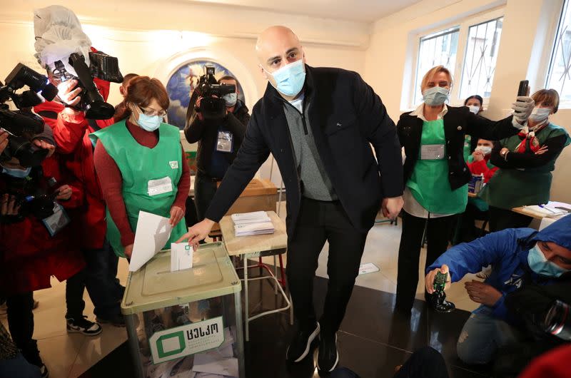 United National Movement leader Nika Melia casts his ballot during the municipal elections in Tbilisi