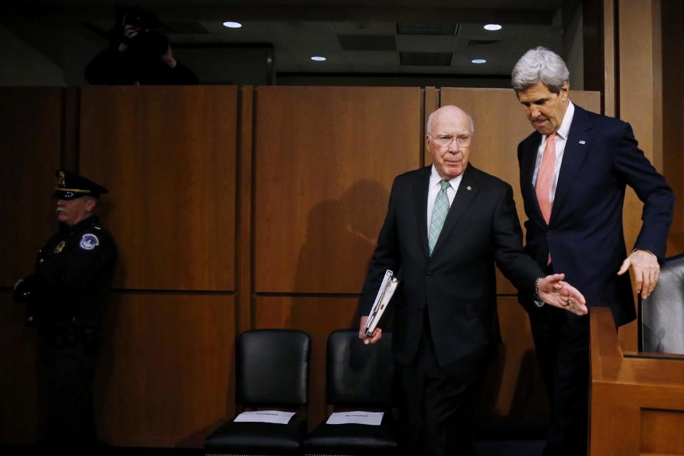 Secretary of State John Kerry walks with Sen. Patrick Leahy, D-Vt. on Capitol Hill in Washington, Thursday, March 13, 2014, prior to Kerry's testimony before the Senate Appropriations subcommittee on Foreign Operations and Related Programs hearing on the State Department's fiscal 2015 budget. In his opening remarks Kerry spoke about Ukraine and other current foreign relation issues. (AP Photo/Charles Dharapak)