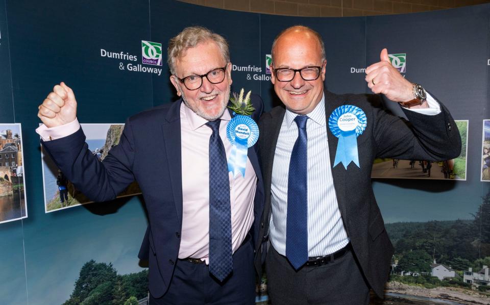 David Mundell, left, and John Cooper, right, were both re-elected in their constituencies