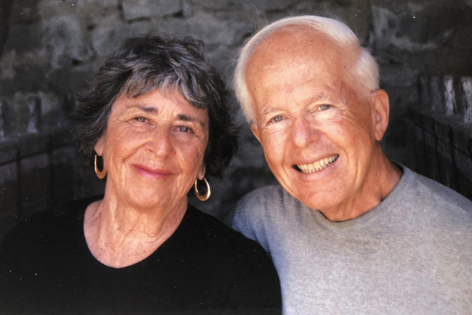 This undated family photo provided by Julia Chachere shows Joan and Ed Porco visiting Cortona, Italy. He was a by-the-book, buttoned-up conservative whose opinions could be quick and blunt. She was an authority-snubbing liberal who would draw stories out in meandering conversation. Both fell victim to the new coronavirus, only days apart. (Julia Chachere via AP)