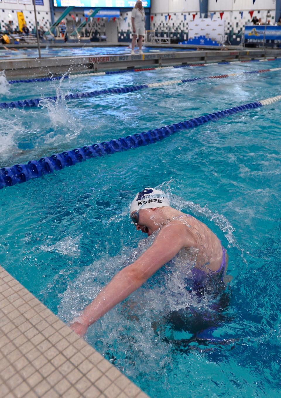 Pittsford’s Sarah Kunze swim in the consolation final of the 200 yard medley relay during the NYSPHSAA Girls Swimming & Diving Championships, Saturday, Nov. 18, 2023.