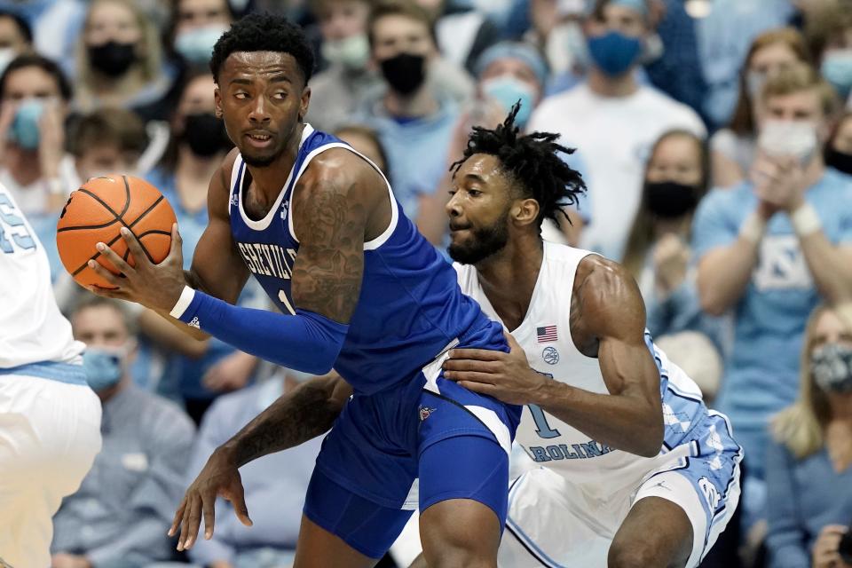 North Carolina’s Leaky Black, right, applies defensive pressure to Jamon Battle of UNC Asheville during the Tar Heels’ victory in November.