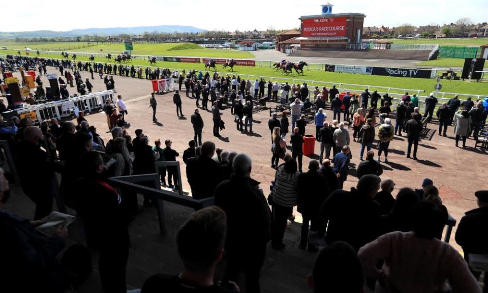 Racegoers watch on as Grangeclare View wins at Redcar.