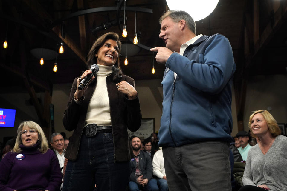 Republican presidential candidate Nikki Haley and Gov. Chris Sununu appear at a town hall campaign event, Tuesday, Dec. 12, 2023, in Manchester, N.H. Haley received the New Hampshire governor's endorsement. (AP Photo/Robert F. Bukaty)