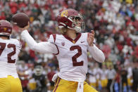 Southern California quarterback Jaxson Dart throws a pass during the first half of an NCAA college football game against Washington State, Saturday, Sept. 18, 2021, in Pullman, Wash. (AP Photo/Young Kwak)