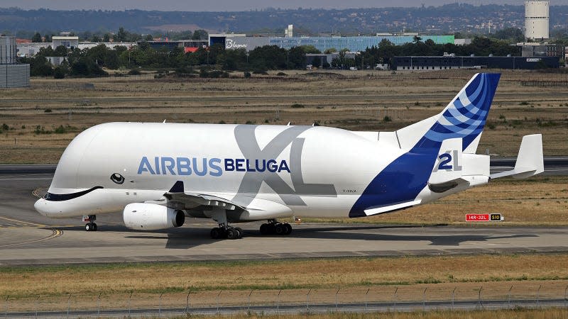 A photo of an Airbus Beluga plane on a runway. 