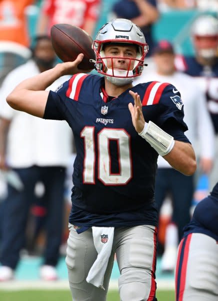 New England Patriots quarterback Mac Jones throws in the forth quarter against the Miami Dolphins on Sunday at Hard Rock Stadium in Miami Gardens, Fla. Photo by Larry Marano/UPI