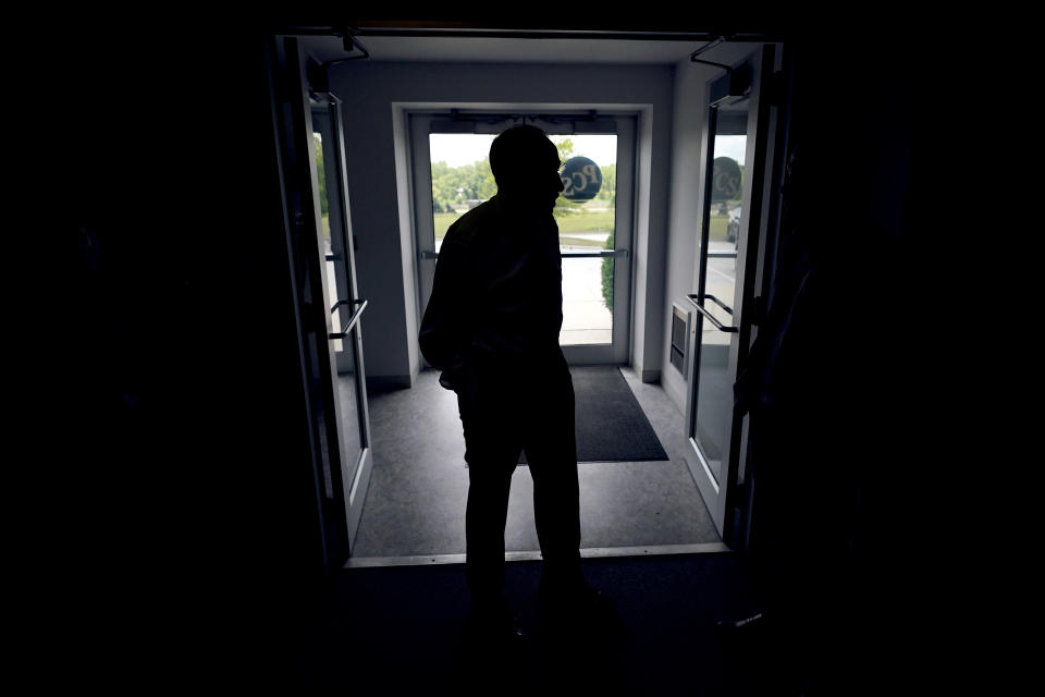 In this June 30, 2021, photo Sen. Chuck Grassley, R-Iowa, arrives at Professional Computer Solutions to meet with employees in Denison, Iowa. (AP Photo/Charlie Neibergall)