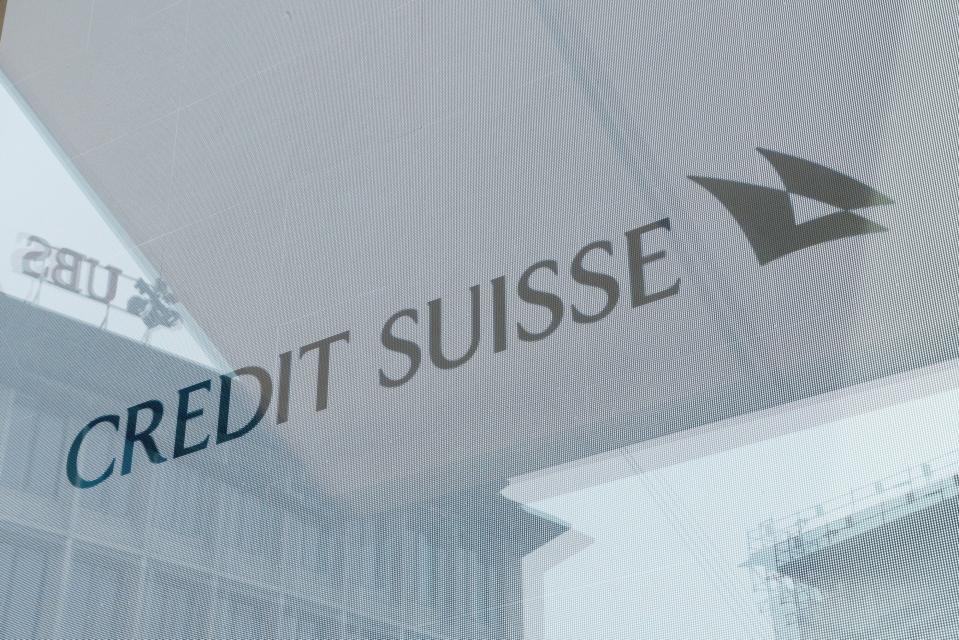 Signage in the window of the Credit Suisse Group AG headquarters in Zurich, Switzerland, on Tuesday, March 21, 2023. (Stefan Wermuth/Bloomberg)