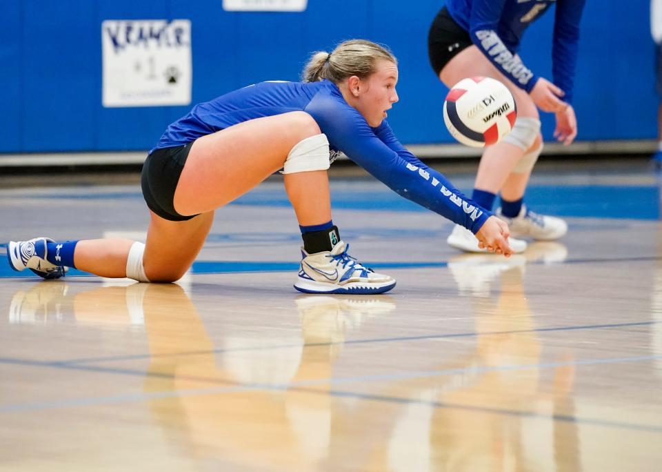 Barron Collier Cougars setter Ava Zehnder (2) digs the ball during the Class 5A Region 3 championship against the Gulf Coast Sharks at Barron Collier High School in Naples on Wednesday, Nov. 1, 2023.