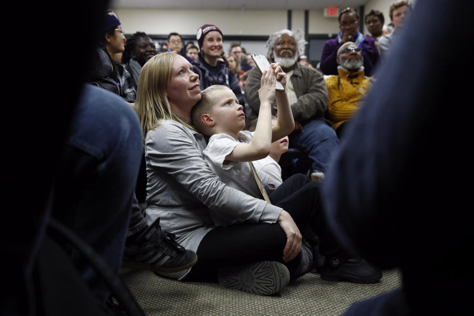 Attendees listen as Democratic presidential candidate Sen. Elizabeth Warren, D-Mass., speaks during a campaign event, Saturday, Jan. 18, 2020, in Des Moines, Iowa. (AP Photo/Patrick Semansky)